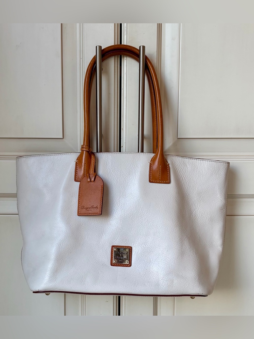 Dooney & Bourke White Leather Tote with Brown Leather Handles. Large size.